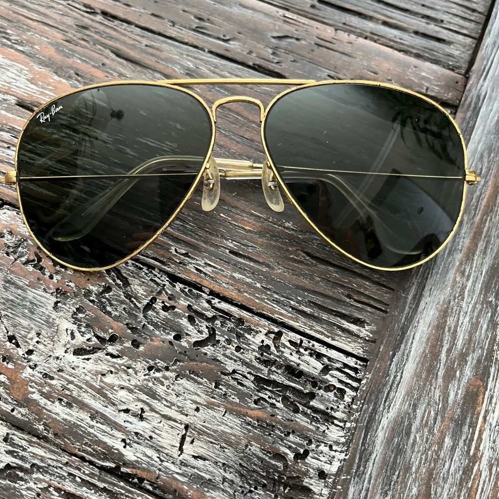 Classic Ray-Ban aviators. Gold frames in well loved condition. Small scratches